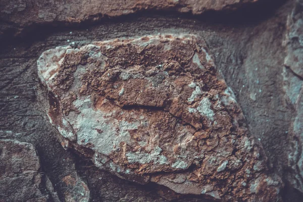 Primo piano del muro di pietra naturale. Struttura della parete di pietra — Foto Stock