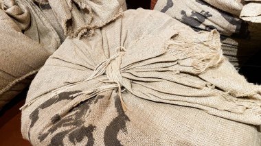 Çuval çuval, kenevir doku arka plan deseni. Hessian doku arka plan desenini kapatma