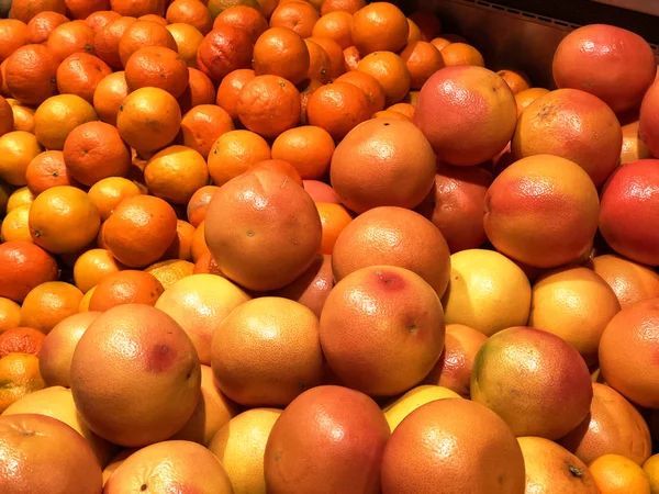 oranges at the market close up background. orange, citrus, many, vitamin, juicy, market, skin, mandarin