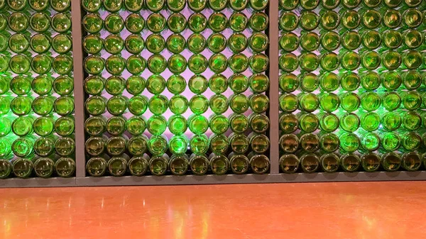 Glass green bottoms from bottles. Abstract background with copy space. — Stock Photo, Image