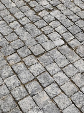 Taştan fayanslar asfalt yol. Yakın çekim