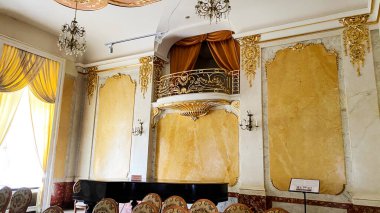 LVIV, UKRAINE - DECEMBER 7, 2019: Potocki Palace in Lviv. Baroque palace. Inside view. clipart