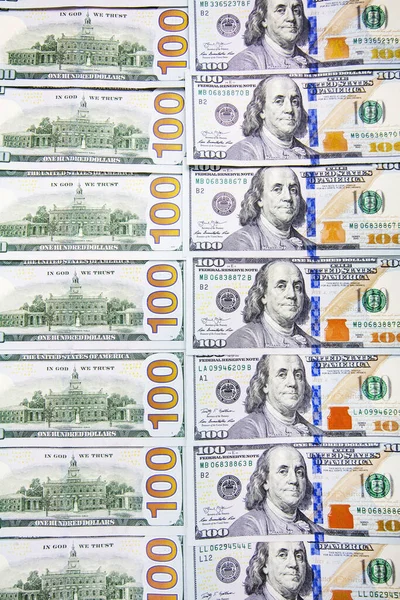 Egy halom bankjegyek elnök portrék velünk. Készpénz a dollár számlák, dollár háttérkép — Stock Fotó