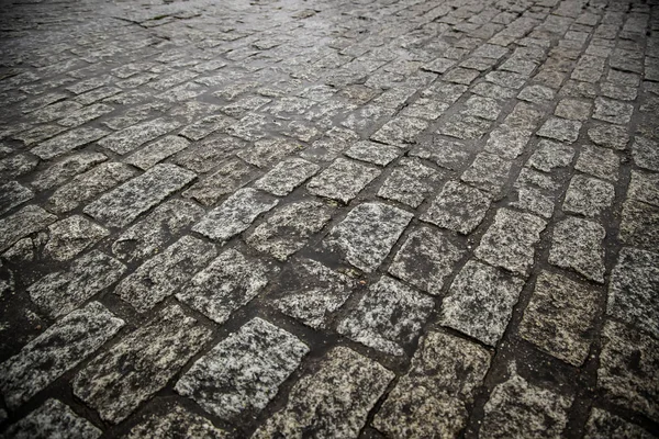 Wet cobblestone floor — Stock Photo, Image