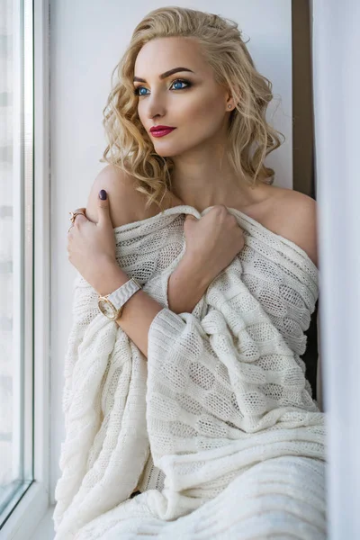 Portrait of a girl on a window — Stock Photo, Image