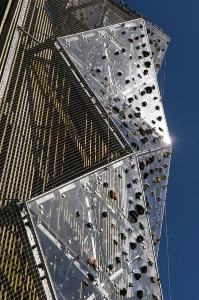 Outdoor climbing wall on a tower — Stock Photo, Image