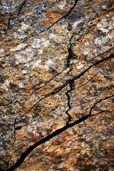 A crack on a brown stone block — Stock Photo, Image