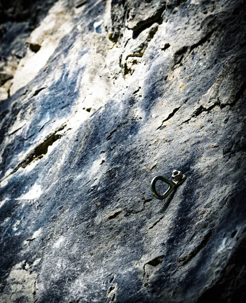Climbing anchor security bolt in rock