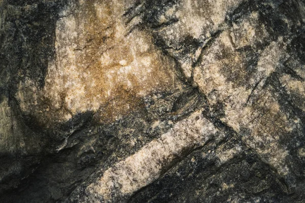 Donkergrijze stenen textuur — Stockfoto