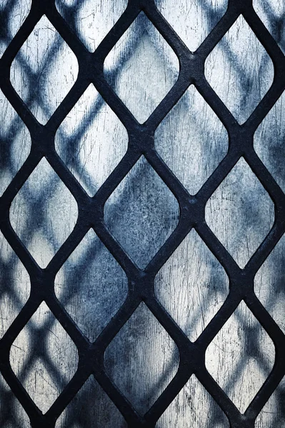 Detail of a black iron grid — Stock Photo, Image