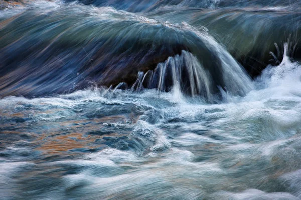 Detail the autumn blurred water rapids — Stock Photo, Image