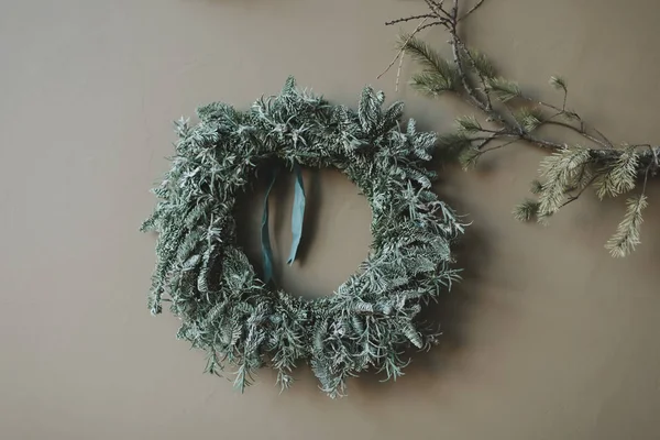 Wreath of spruce. Christmas decorations. Holiday concept. New Year holiday composition. Christmas wreaths in New Year interior.
