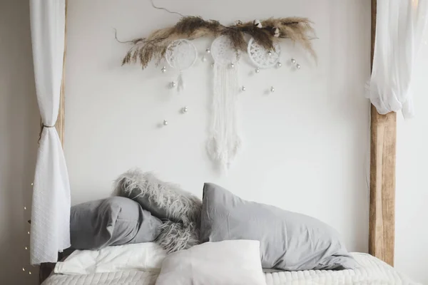 Modern home interior design. Bed with pillows, blanket. Bedroom interior, scandinavian style. Home decor. — 스톡 사진