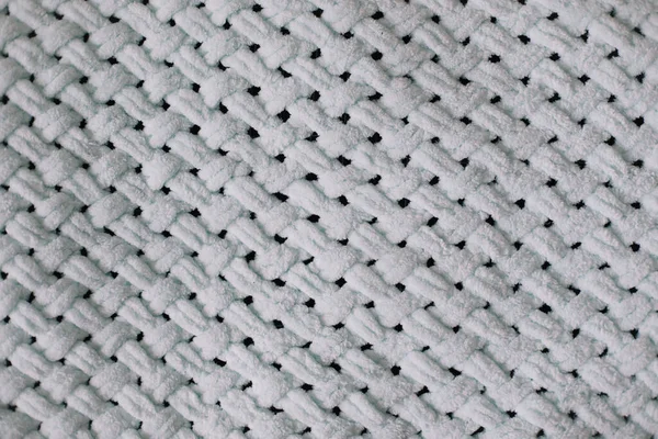 Textur aus gestricktem Wollstoff für Tapeten und einen abstrakten Hintergrund. Gestrickte Textur Hintergrund. Muster aus Wolle. — Stockfoto