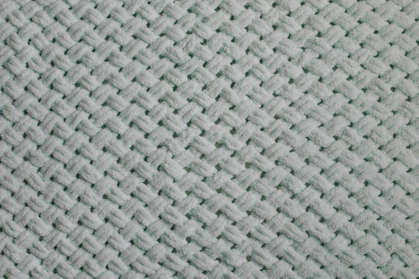 Tło tekstury tkaniny. Wykonany na drutach wzór tekstury. Tekstura dzianiny wełniane tło tkaniny. Bliższe tło tekstylne. — Zdjęcie stockowe