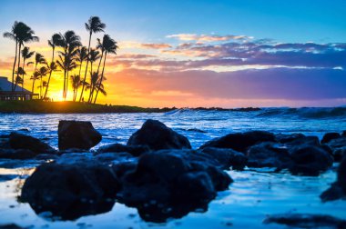 Sunrise over the coast of Kauai, Hawaii. clipart