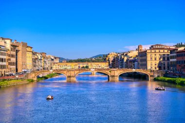A view of the Arno River towards the Ponte Vecchio in Florence, Italy.