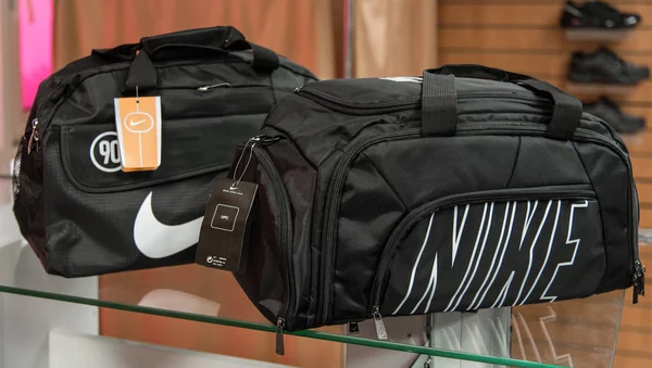 Novokuznetsk, Russia - August 30, 2017: sports bags Nike on the shelf — Stock Photo, Image