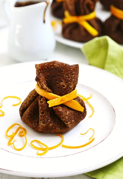 Chocolate pancakes with orange and chocolate — Stock Photo, Image