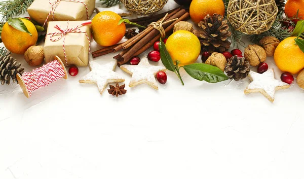 Christmas background with holiday decoration and gifts, top view — Stock Photo, Image