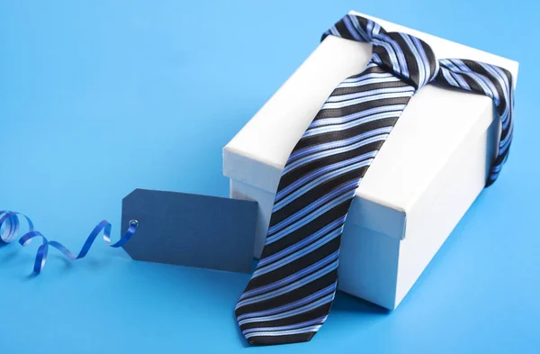 Gift box with blue striped tie. Happy father's day idea, sign, s — Stock Photo, Image