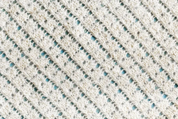 Gebreide sjaal achtergrond. Sjaal van geitengarens, met de hand gebreid — Stockfoto