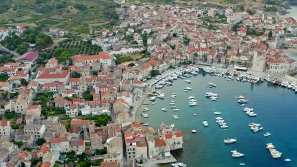 Harbor with yachts and boats parked on sea in small town in summer. — Stock Video