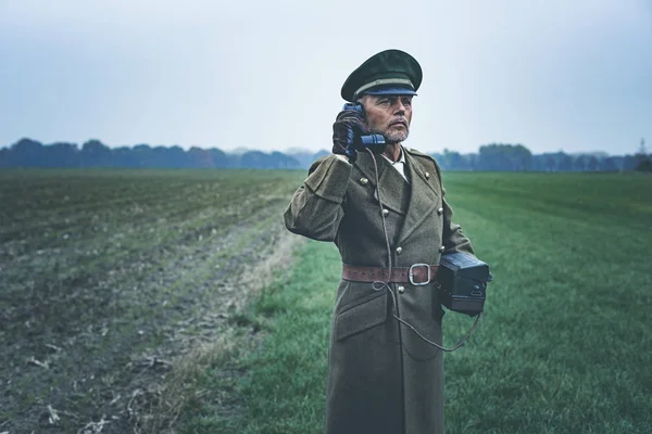 Military officer calling with field phone — Stock Photo, Image