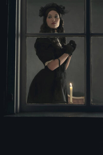 Victorian woman in black dress 