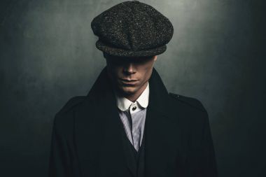 English gangster with flat cap
