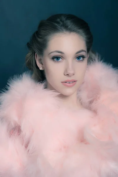 Young woman wearing feather boa — Stock Photo, Image