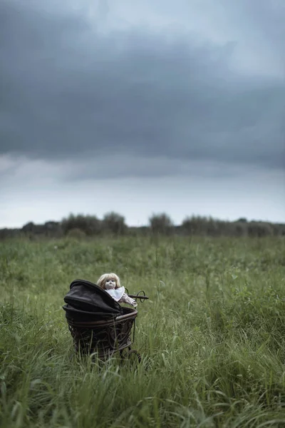 Spooky doll in pram — Stock Photo, Image