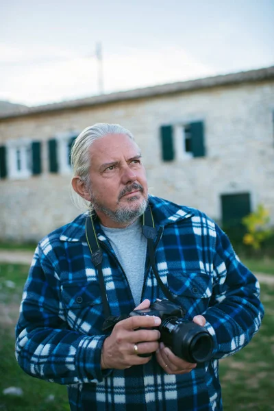 Photographer in ghost town Old Perithia — Stock Photo, Image