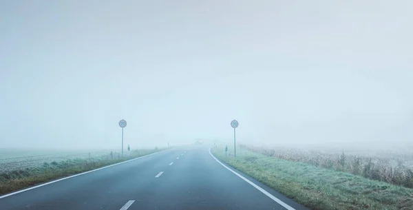 Country road with speed signs — Stock Photo, Image