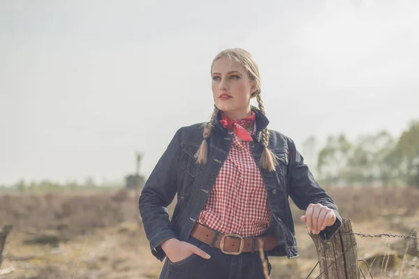 Vintage woman in jeans jacket — Stock Photo, Image