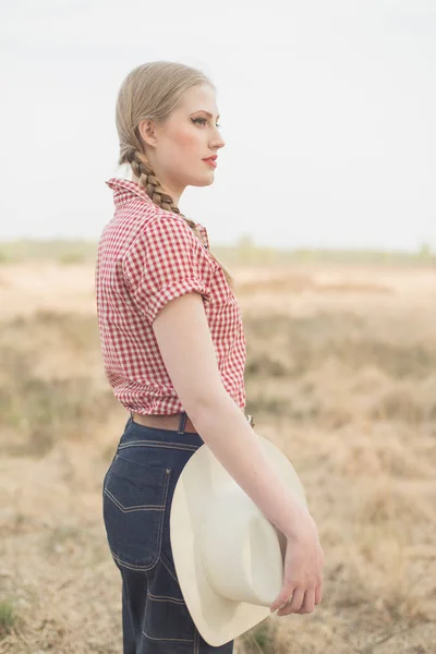 Retro cowgirl with white hat — Stock Photo, Image