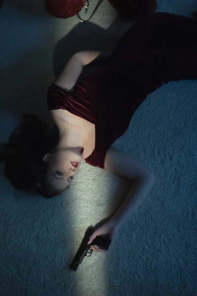 Killed Woman Red Dress Holding Pistol Her Hand Lying Floor — Stock Photo, Image