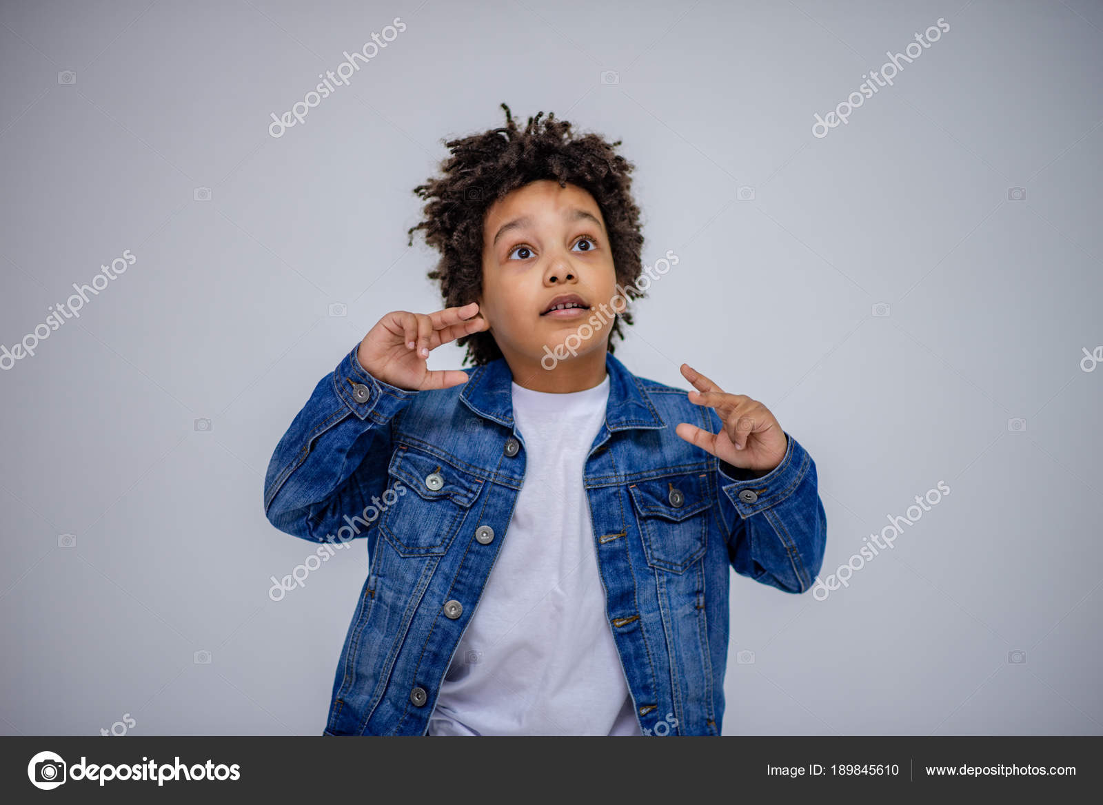 Dark Skinned Boy Blue Jeans White Sweater Different Poses Shows