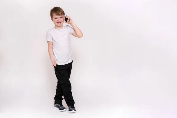 Cute Year Old Boy Talking Phone Clicking Buttons Smartphone White — Stock Photo, Image