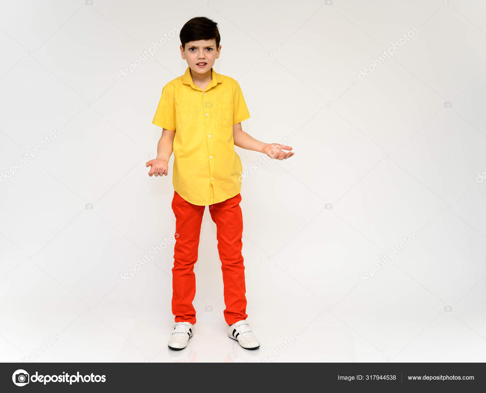Boy 8 Years Old In Denim Shirt Red Pants And 3d Dadget Technology Stock  Photo, Picture and Royalty Free Image. Image 74951250.