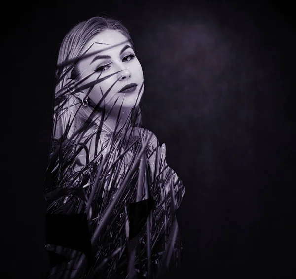 Fashionable Large-scale Artistic Portrait on a gray background of a pretty girl with good make-up with combed hair. The concept of beauty, mystical mood, romance and glamor. Double exposure. — ストック写真