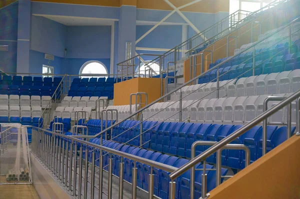 The concept of empty stands. Photo of the seats of fans at the stadium. — Stock Photo, Image