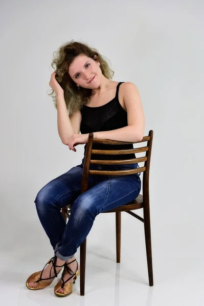 Portrait on a chair girl