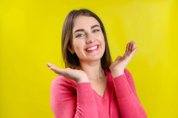 Portrait Pretty Young Caucasian Brunette Woman Yellow Background Pink Sweater — Stock Photo, Image