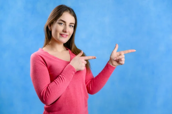 Portrait Blue Background Pretty Brunette Caucasian Woman Red Sweater Showing — Stock Photo, Image