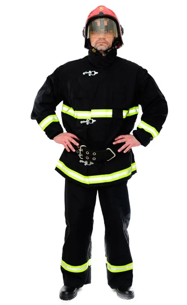 Retrato Bombeiro Uniforme Preto Capacete Vermelho Fundo Branco Isolado — Fotografia de Stock