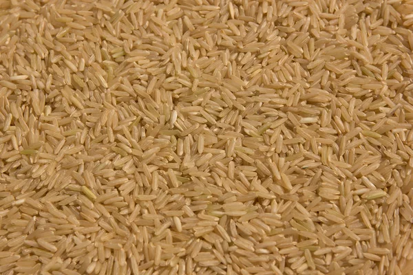 Ziarna ryżu brązowego tła — Zdjęcie stockowe