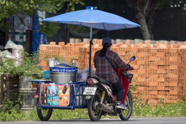 Bir motosiklet üzerinde dondurma satış