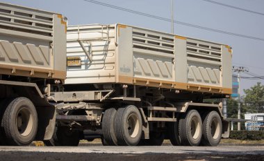 Chiangmai, Thailand - December 12 2019: Private Isuzu Dump Truck. On road no.1001 8 km from Chiangmai Business Area.