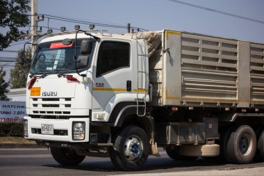Chiangmai, Thailand - December 12 2019: Private Isuzu Dump Truck. On road no.1001 8 km from Chiangmai Business Area.